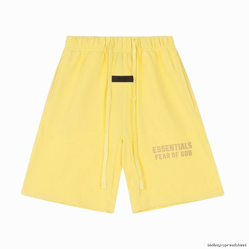 ESSENTIALS minimalist style yellow shorts