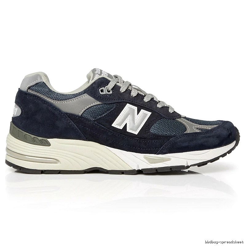 New Balance retro-style dark blue and grey sports shoes