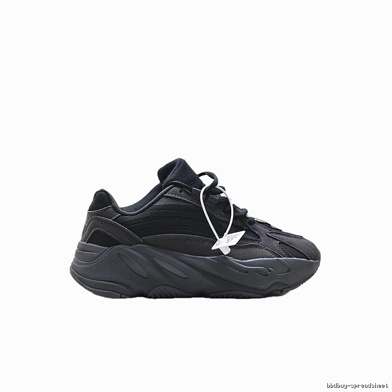 Retro-style black Yeezy 700 shoes